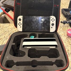 Handheld Gaming Console with White and Black Design